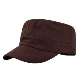 Detail of dark brown flat top military cap with reinforced stitched brim and cotton fabric