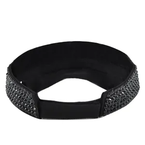 Detail of black rhinestone headband with adjustable velcro closure and shimmering finish
