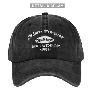 Detail view of vintage black washed cotton baseball cap with white 3D embroidery and air vents