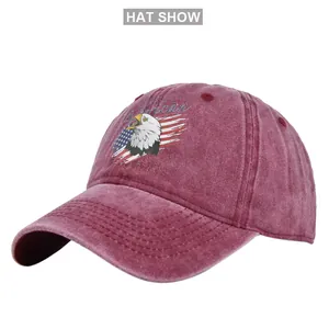 Detailed embroidery of American eagle on burgundy washed cotton baseball cap