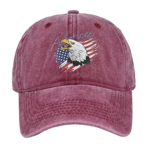 Macro detail of vintage burgundy washed cotton baseball cap with American eagle embroidery