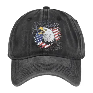 Detail of washed black cotton fabric with American eagle and flag embroidery on the cap
