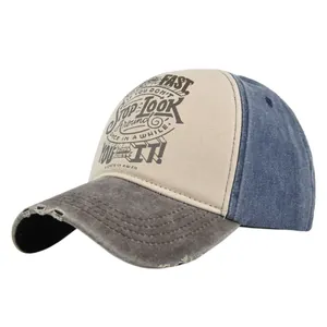 Close-up of vintage Route 66 baseball cap with distressed brim and tricolor stitching