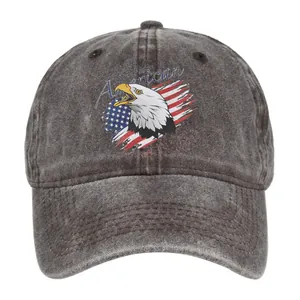 Close-up of eagle print and American flag design on washed grey baseball cap