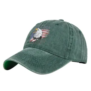 Detail of vintage green baseball cap featuring eagle embroidery and American flag patch