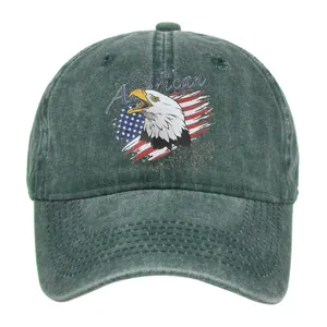 Close-up of vintage eagle embroidery and American flag on green washed cotton cap