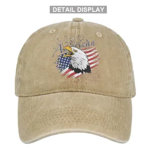 Detail of vintage khaki baseball cap with embroidered American eagle and flag on cotton