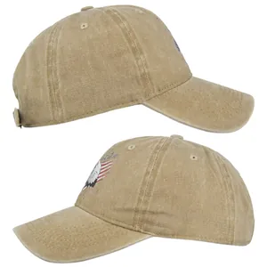 Detailed side view of khaki American eagle and flag embroidery on cotton baseball cap