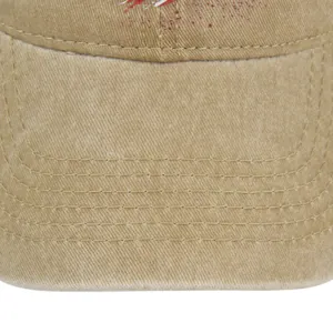 Detailed close-up of khaki washed cotton visor with four rows of reinforced stitching