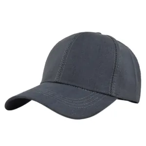 Close-up of dark grey baseball cap showing detailed ribbed texture and precision stitching
