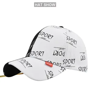 Detail view of the black and white baseball cap with all-over sport print and side tag