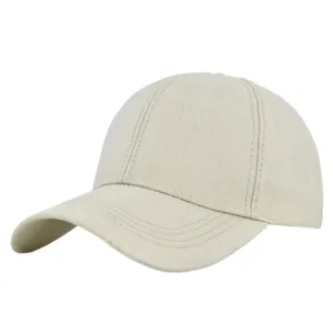 Close-up of beige cotton baseball cap featuring textured weave and curved brim stitching
