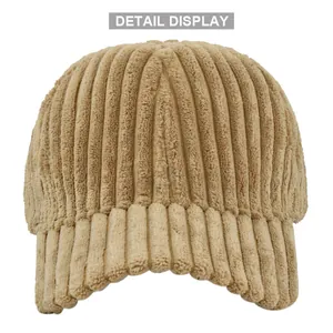 Close-up of thick ribbed corduroy texture on khaki baseball cap detail display