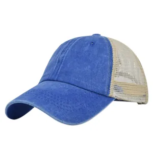 Detail view of washed blue denim baseball cap with breathable beige mesh back