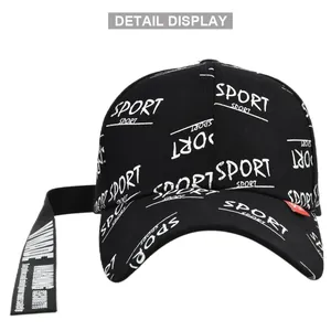 Detail view of black baseball cap with white Sport prints and a long decorative strap