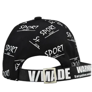 Detail view of the long adjustable strap with white bold text on a black baseball cap
