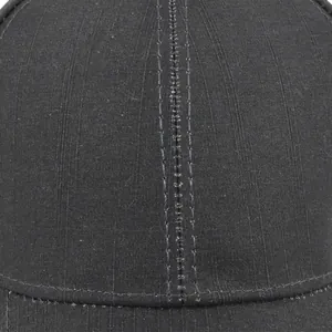 Classic black baseball cap detail showing premium fabric texture and parallel stitching
