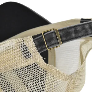 Detail of adjustable metal buckle on washed vintage breathable mesh baseball cap