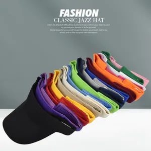 Detailed stack of multi-color visor hats showcasing a variety of vibrant twill fabric options