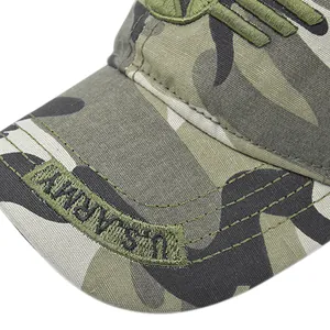 Close-up of green U.S. ARMY embroidery and camouflage patterns on tactical cap brim