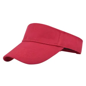 Side view of red cotton sun visor hat with wide brim and decorative stitching