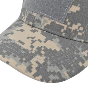 Close-up of digital camo tactical cap showing ripstop fabric and velcro patch area