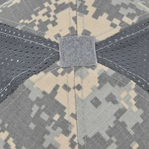 Macro detail of digital camo tactical cap top with hook-and-loop patch and breathable mesh
