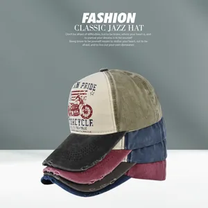Close-up of vintage distressed Route 66 mesh trucker caps in various faded colors