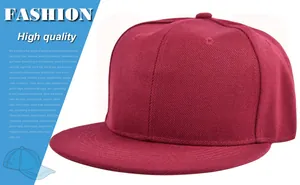Close-up of wine red flat brim baseball cap showing cotton fabric and six-panel crown