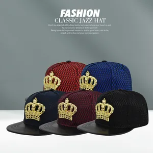 Detail view of hip-hop trucker caps with crown emblem and faux leather brim in various colors