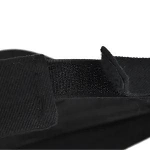 Detailed close-up of the adjustable black hook-and-loop strap on the mesh baseball cap