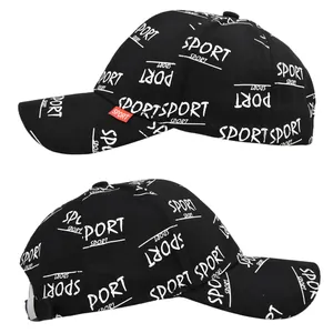 Close-up of black baseball cap featuring white SPORT embroidery and red side label detail