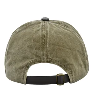 Detail view of vintage olive green baseball cap with adjustable strap and metal buckle