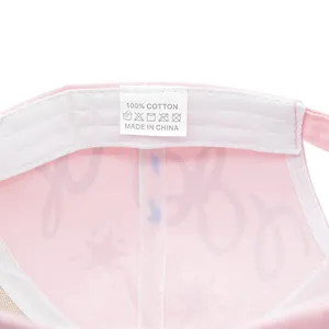 Detail of 100% cotton inner lining and stitching on pink graffiti baseball cap