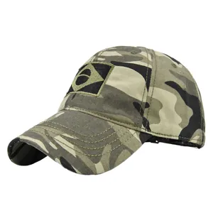 Close-up of jungle camouflage tactical cap featuring detailed Brazilian flag embroidery