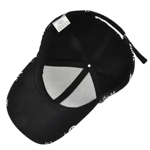 Detail view of cotton baseball cap interior showing 6-panel stitching and care label