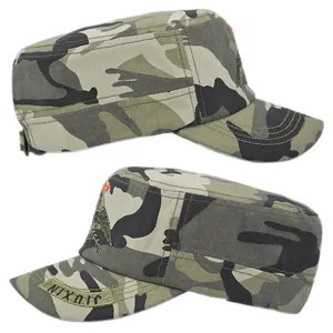 Detail of camouflage military cap with eagle embroidery and Nixon text on the brim