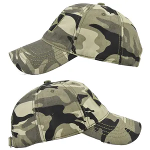 Detail of woodland camouflage military cap showing durable canvas texture and velcro patch