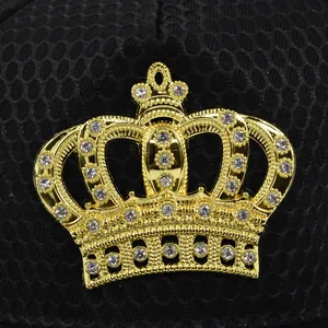 Hip hop trucker hat featuring a gold crown metal emblem and sparkling rhinestones