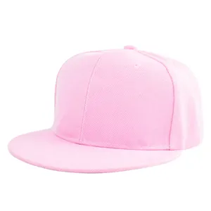 Detail view of pink flat brim snapback hat showing cotton twill texture and ventilation eyelets