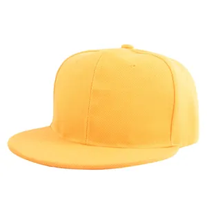 Detailed side view of yellow flat brim snapback hat showing twill cotton texture