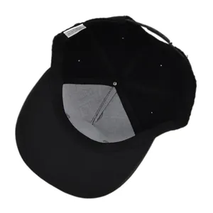 Detail view of the crown hip hop cap interior showing 100% acrylic tag and sweatband