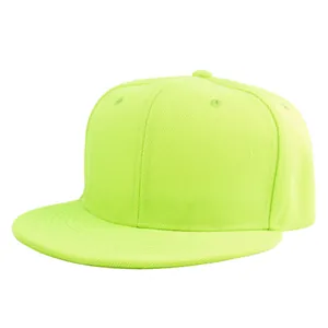 Detail of neon green flat brim baseball cap showing twill texture and ventilation eyelets