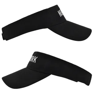 Close-up of New York embroidery on black sports sun visors with mesh breathable fabric
