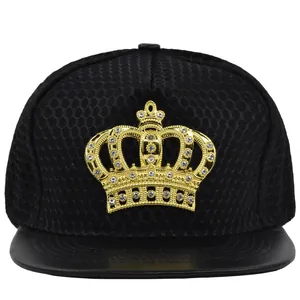 Black hip hop snapback cap with mesh texture, leather brim and a gold rhinestone crown