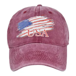 Detail of washed burgundy baseball cap with USA embroidery and American flag print