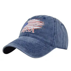 Close-up of USA embroidery on vintage washed denim baseball cap with stitched brim