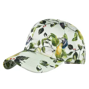 Detail of floral baseball cap showing smooth satin fabric and silver metal buckle