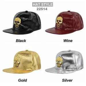 Detail of four hip-hop snapback hats with faux crocodile texture and gold skull emblem