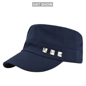 Detailed view of navy blue flat top army cap with silver square metal rivets on side